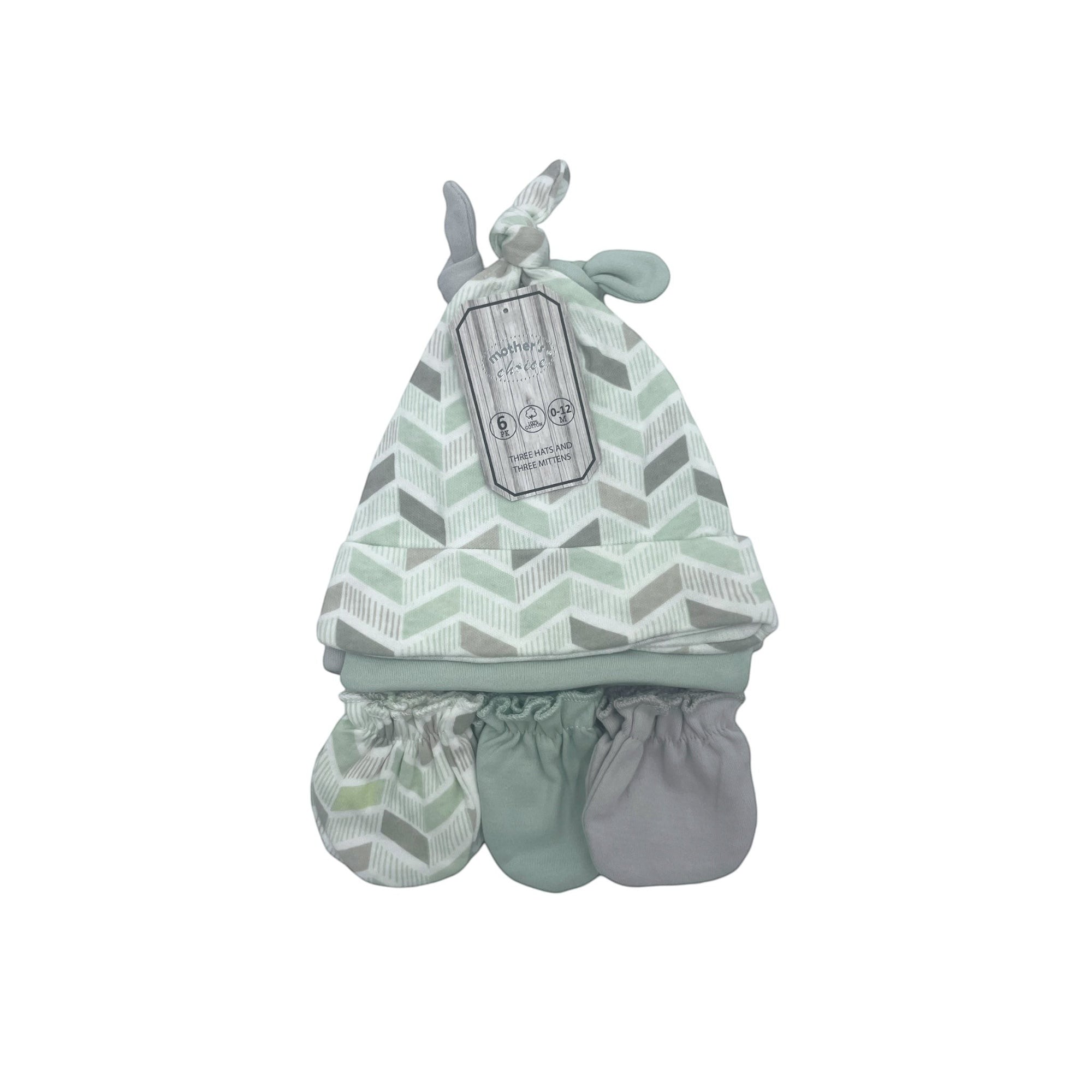 Baby hat and booties set with chevron pattern on a white background