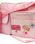 Pink diaper bag with butterfly design on a white background
