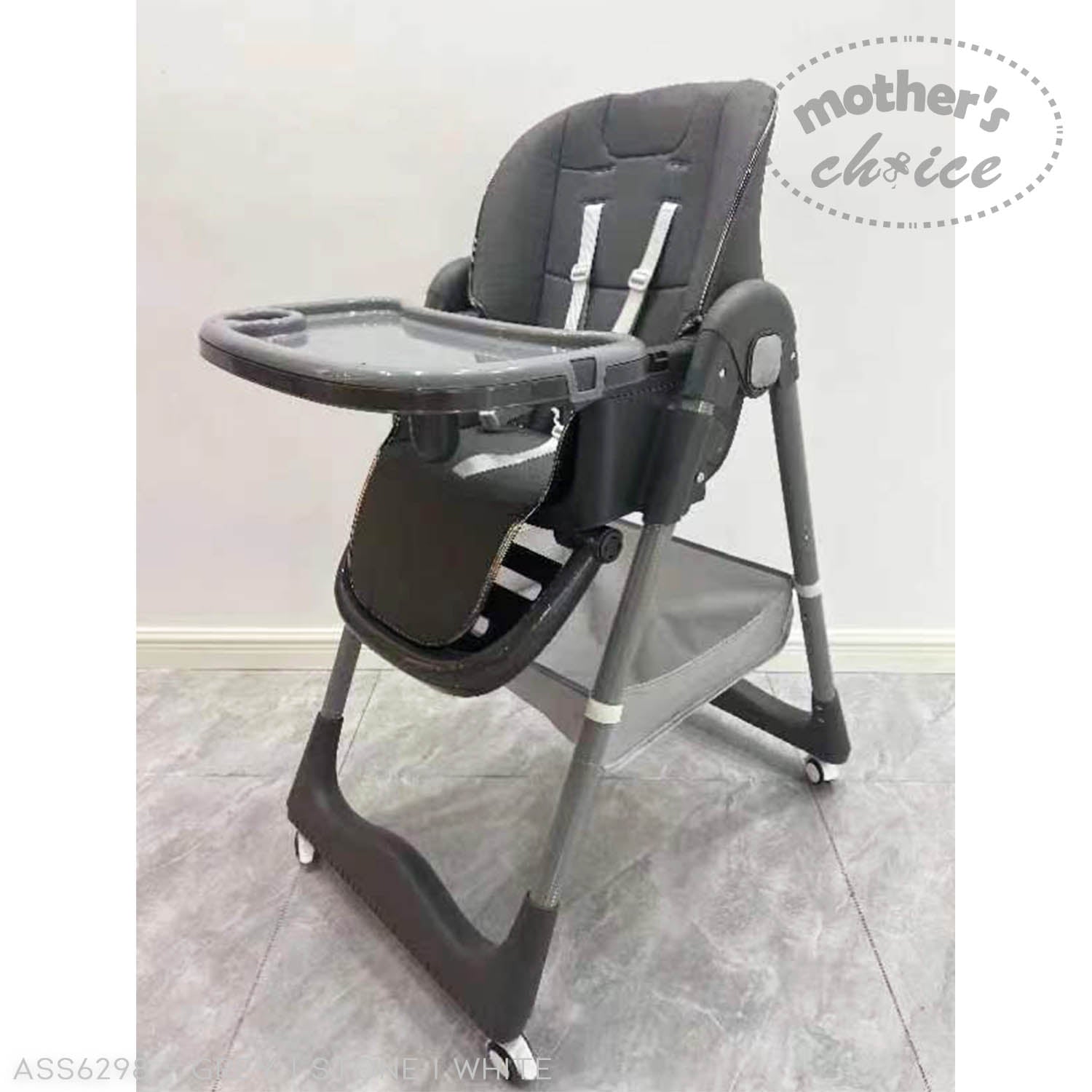 Gray high chair with tray on a light gray floor, branded 'Mother's Choice'.