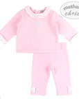 Pink baby outfit with lace collar on a white background, featuring 'Mother's Choice' branding.