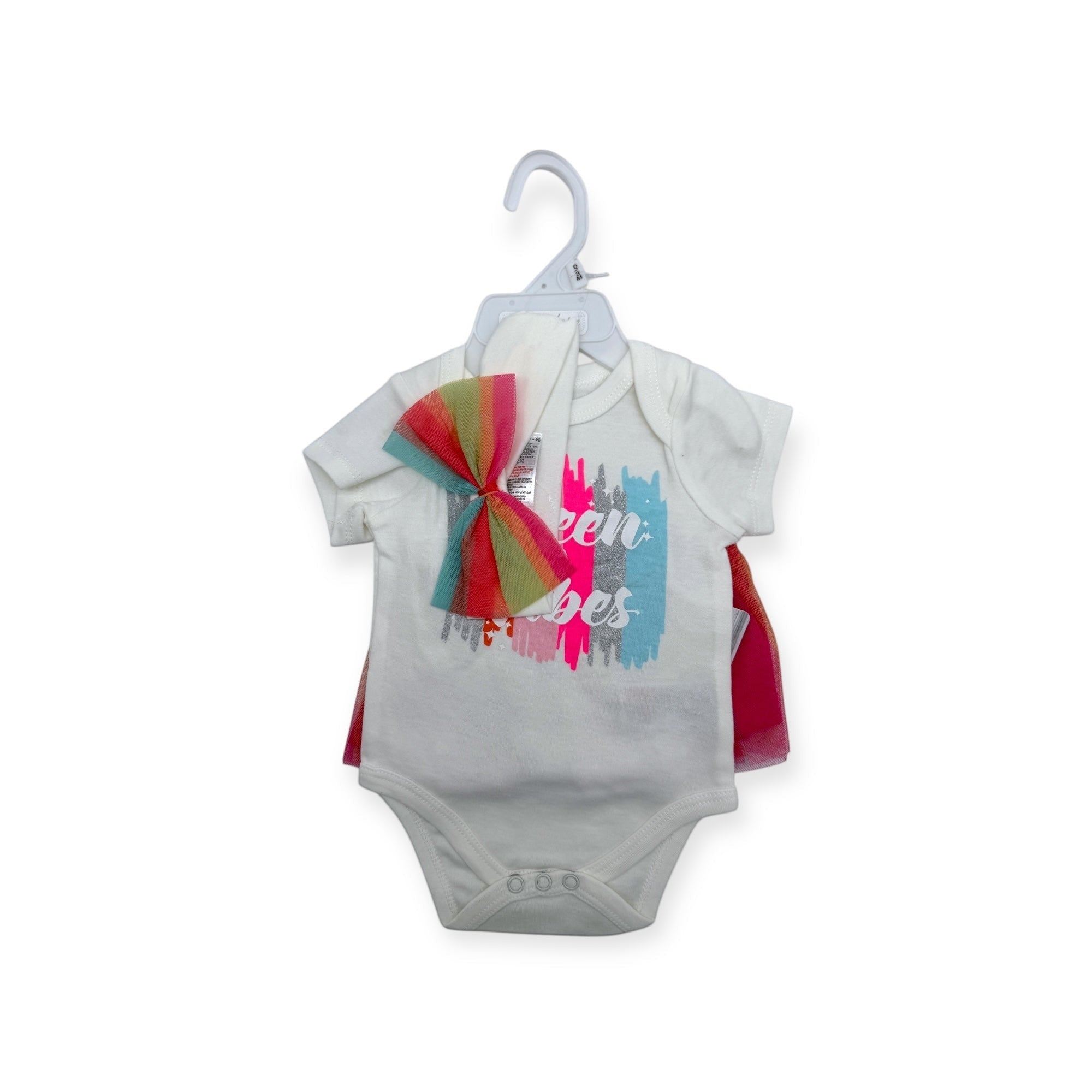 Baby onesie with colorful design on a hanger against a white background
