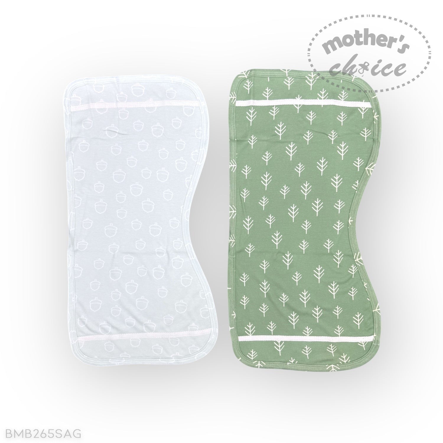 Green baby bib with white leaf pattern and clear plastic bag on a white background