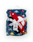 Children's blanket with car pattern and red airplane design, tied with a white ribbon on a white background.