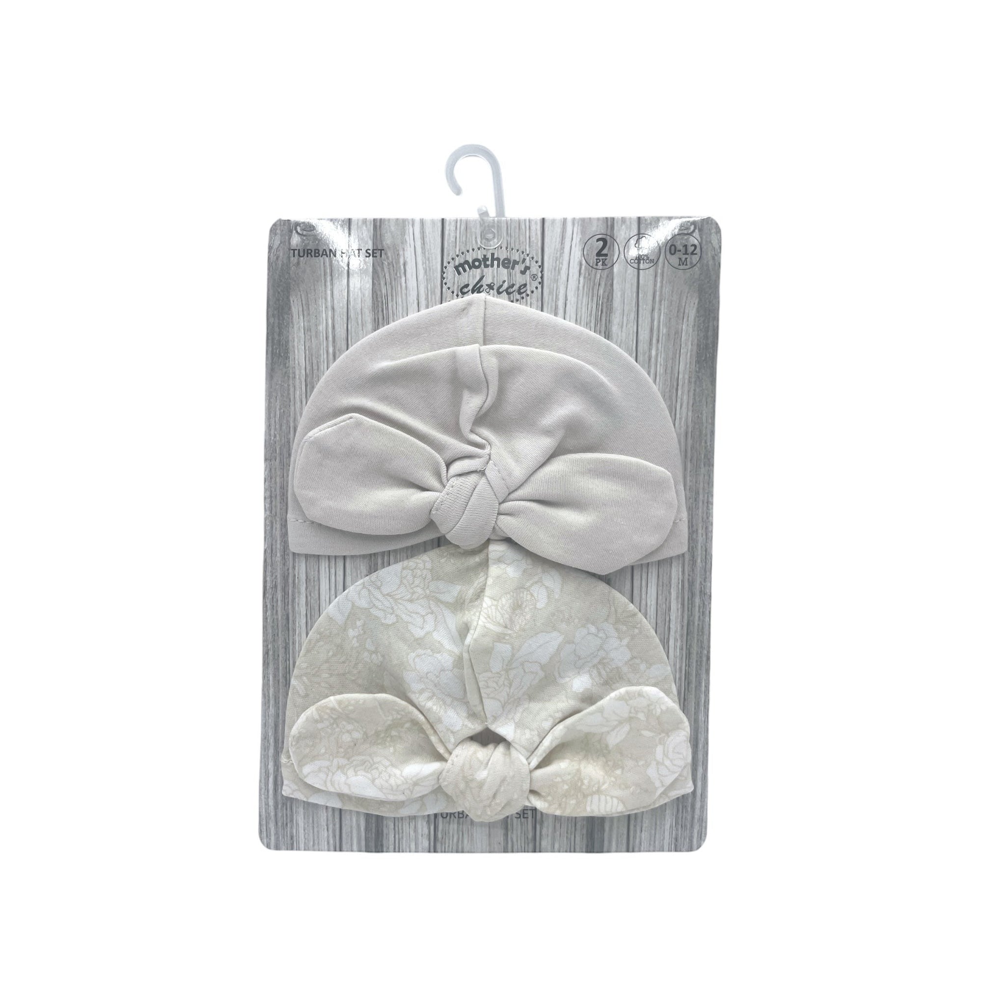 Gray baby turban with bow in packaging on a white background