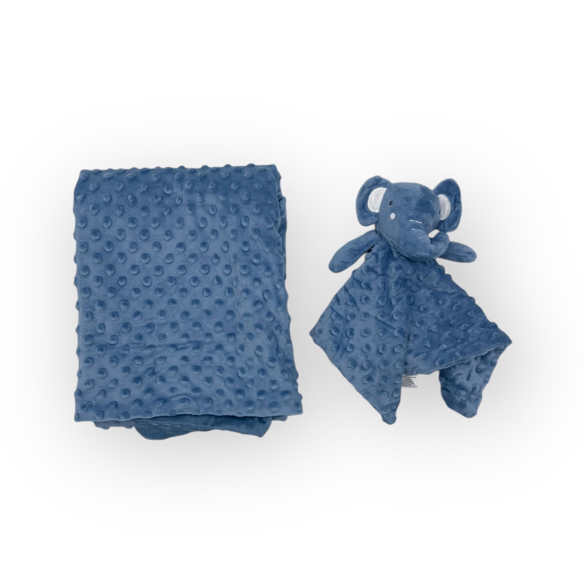 Blue textured blanket and elephant-shaped toy on a white background