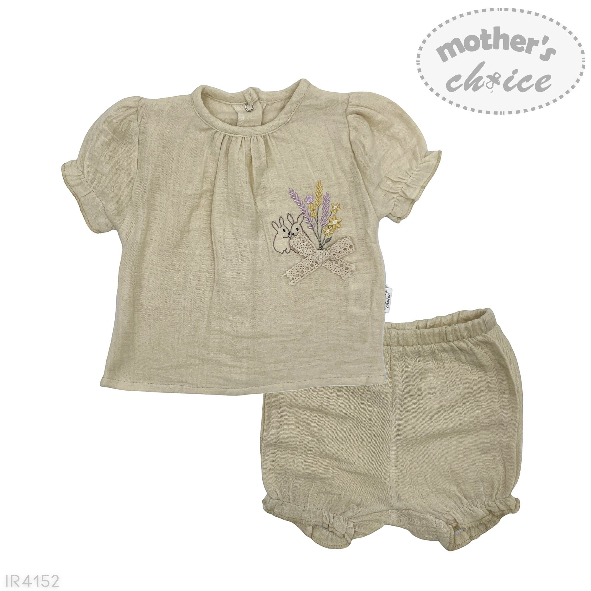 Beige baby outfit with embroidered design on a white background