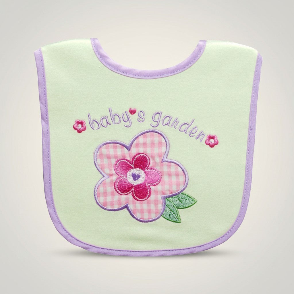 Light green baby bib with pink flower and 'baby's garden' text on a light gray background