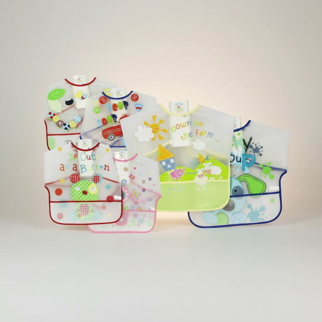 Set of colorful children's bibs with various designs on a white background