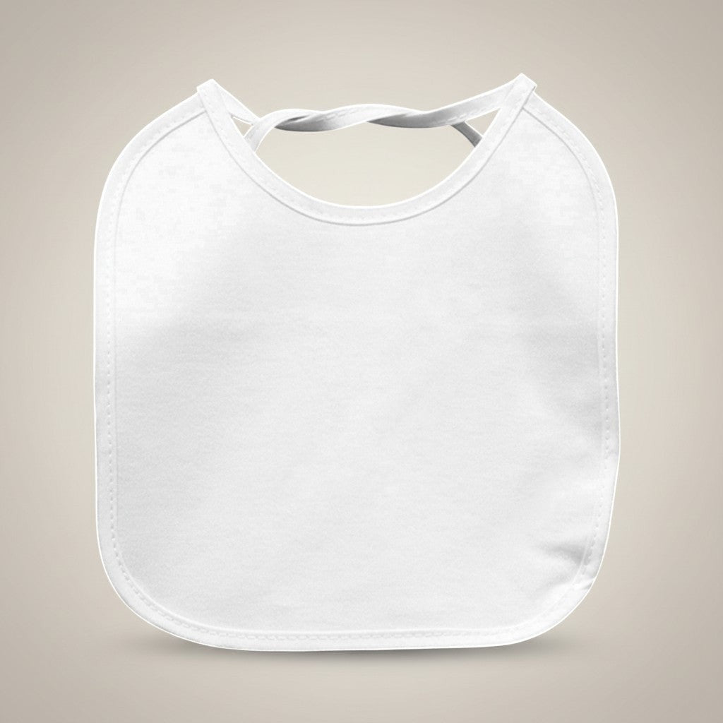 White baby bib on a beige background