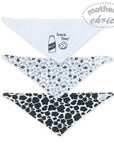 Stork And Baby 3 pack white bandana bibs with milk bottle, cookie, and cow print designs.