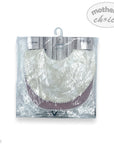 Packaged baby bib with 'mother's choice' branding on a white background