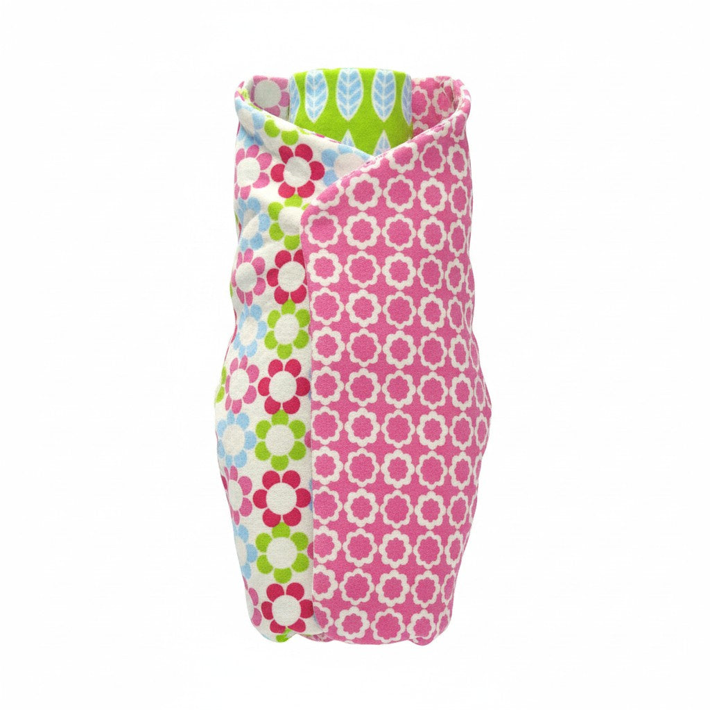 Colorful patterned fabric swaddle on a white background