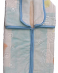 Folded baby blanket with cartoon designs on a white background