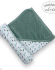 Two baby blankets, one green and one with a floral pattern, on a white background with 'mother's choice' branding.