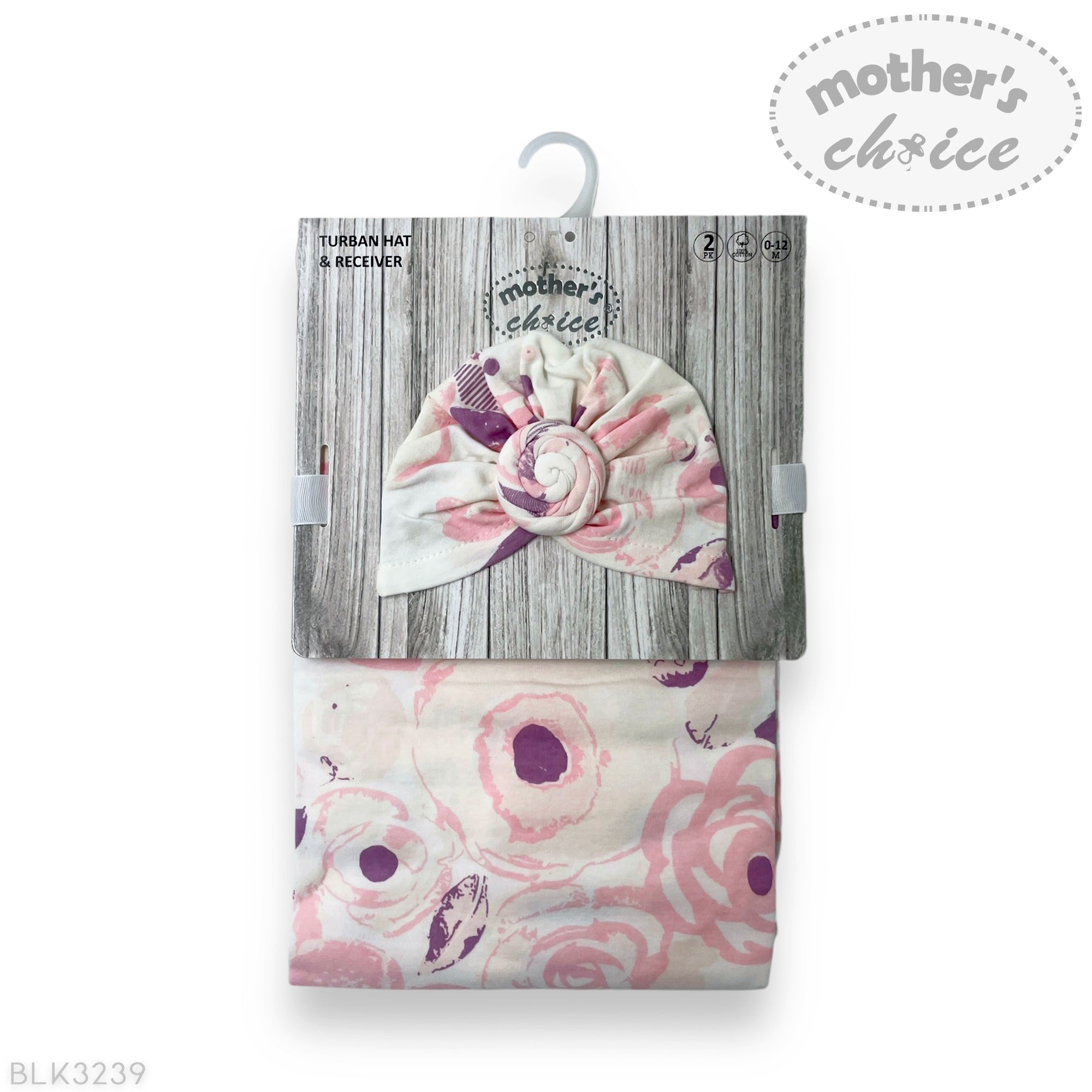 Floral-patterned turban hat and matching blanket with 'Mother's Choice' branding on a wooden background.