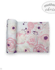 Floral-patterned fabric swatch with 'Mother's Choice' branding on a white background