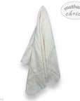 Folded white towel with 'mother's choice' branding on a white background