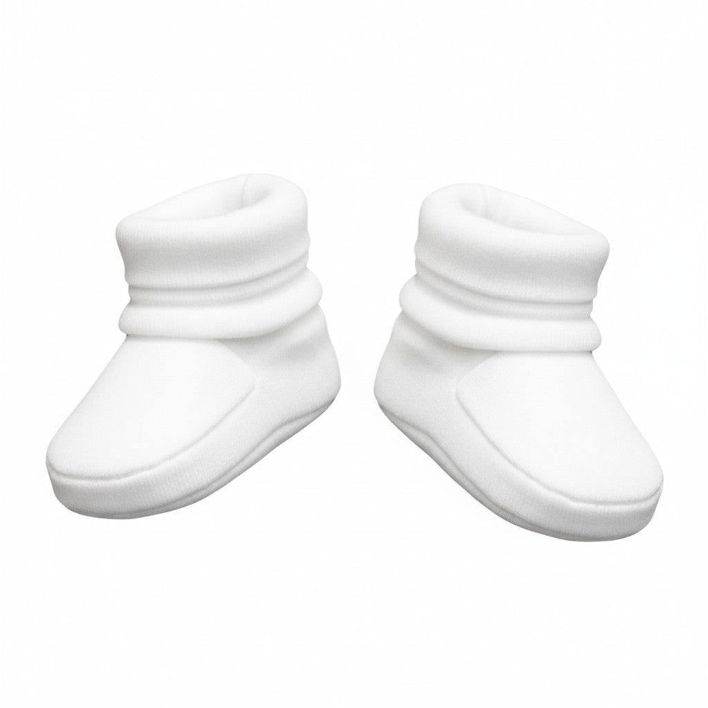 Pair of white baby booties on a white background