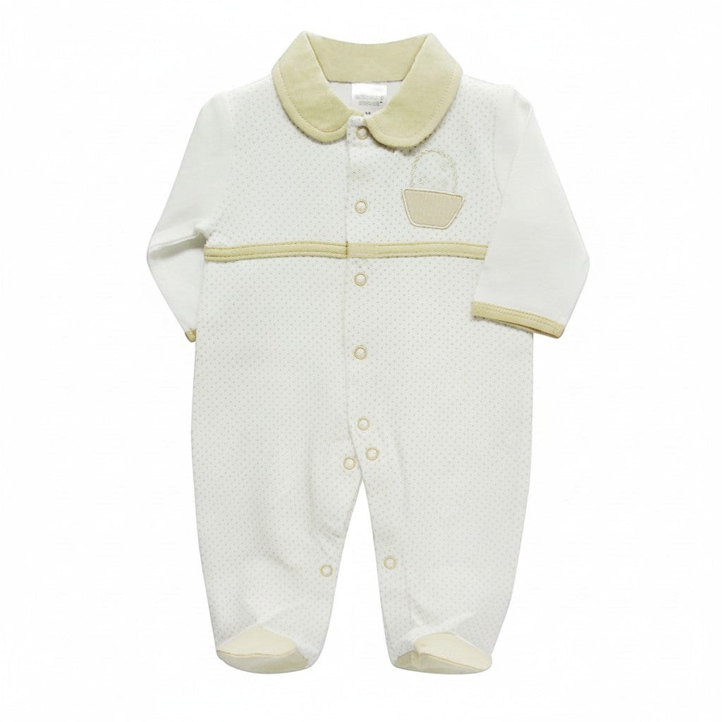 White baby onesie with beige collar and trim on a white background