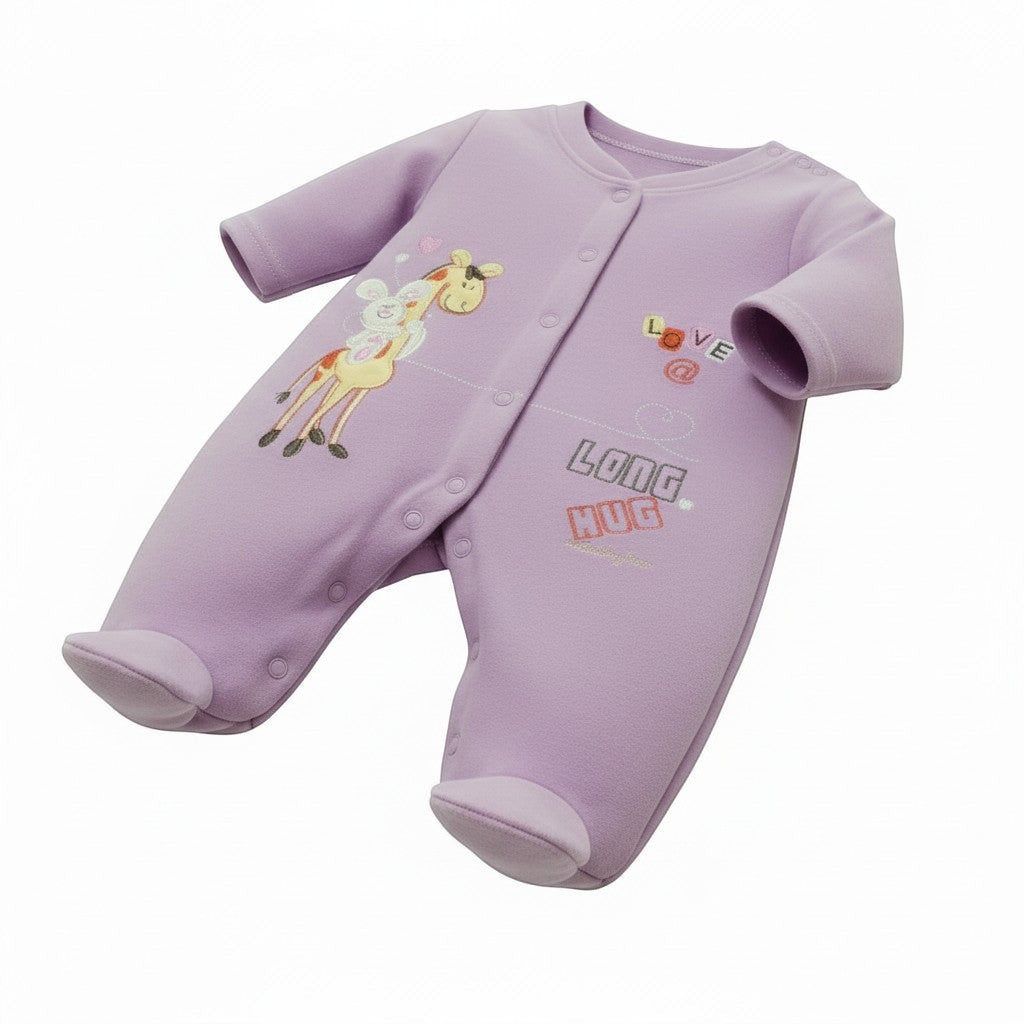 Purple baby onesie with cartoon design and text on a white background