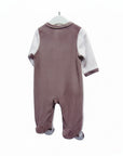 Baby onesie with patterned sleeves on a white background