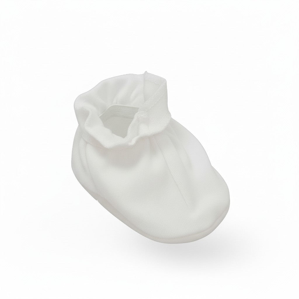 White baby bootie on a white background