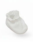 White baby bootie on a white background