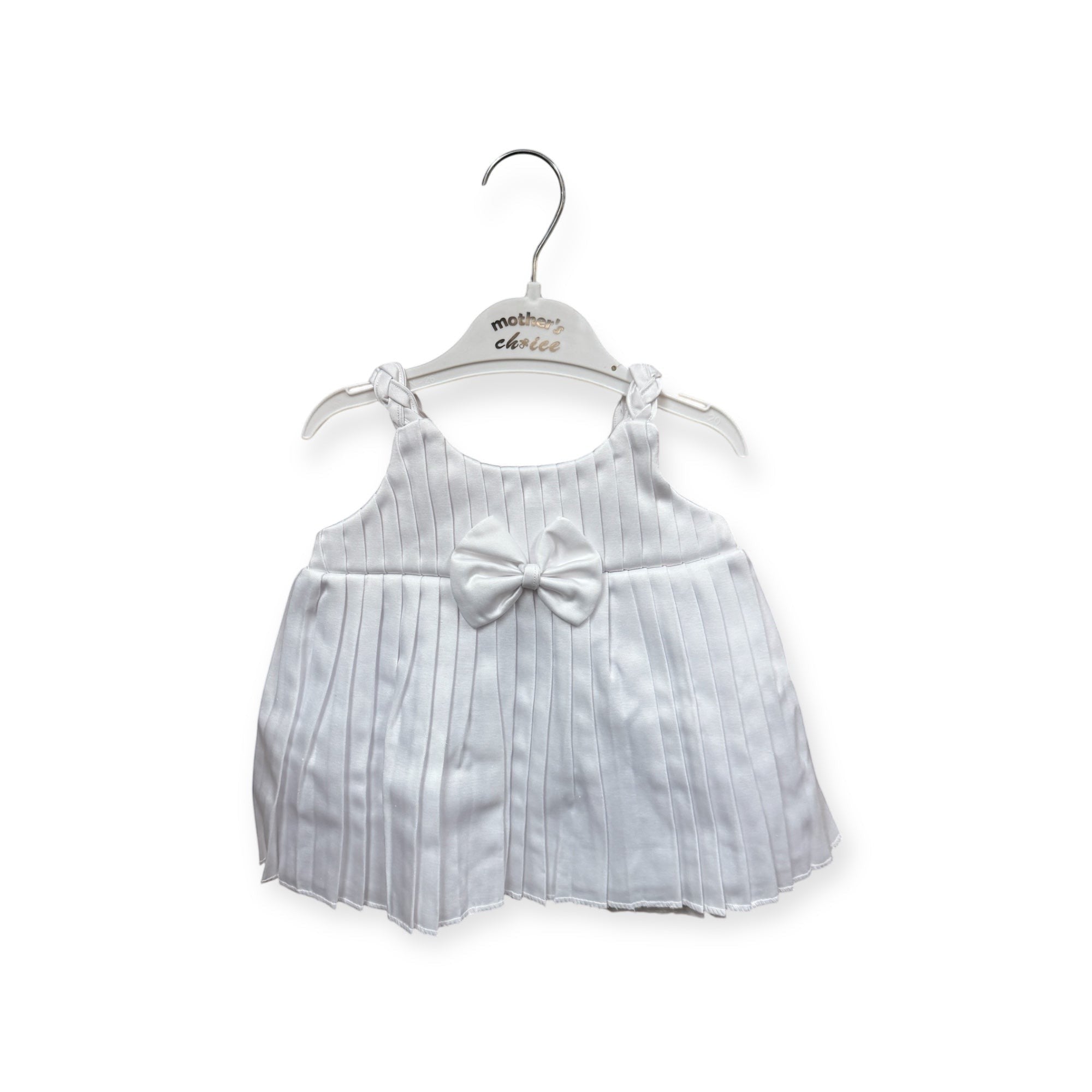 Baby dress with a bow on a hanger against a white background