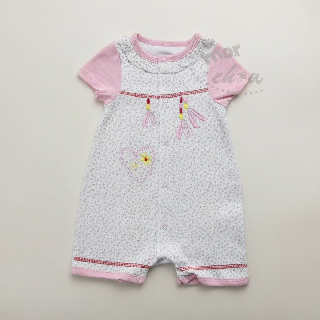 Baby romper with pink sleeves on a light gray background