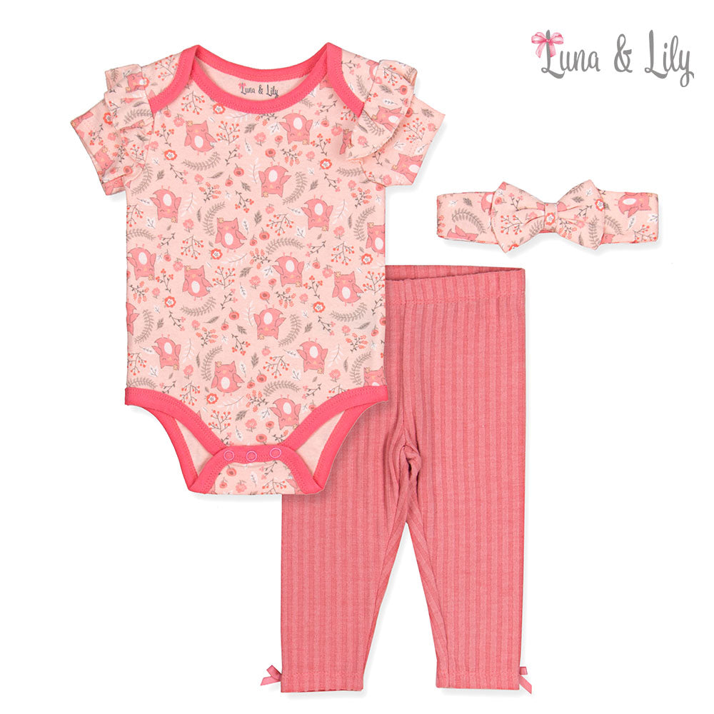 Baby outfit set with bodysuit, pants, and headband featuring pink and white patterns on a white background.