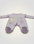 Purple baby onesie with a giraffe design on a white background
