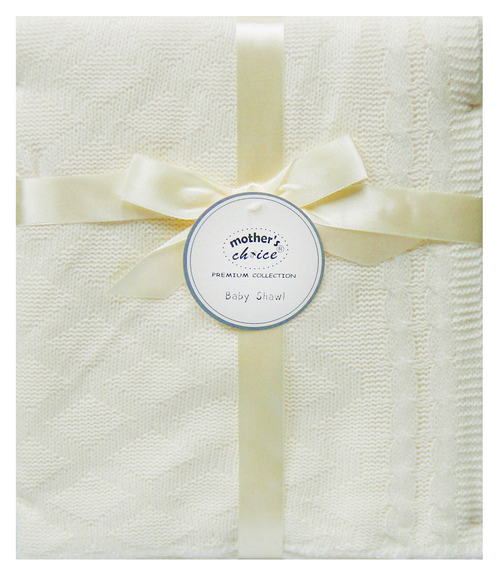 White baby blanket with a ribbon and 'mother's choice' label