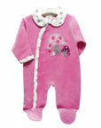 Pink baby onesie with mushroom design on a white background