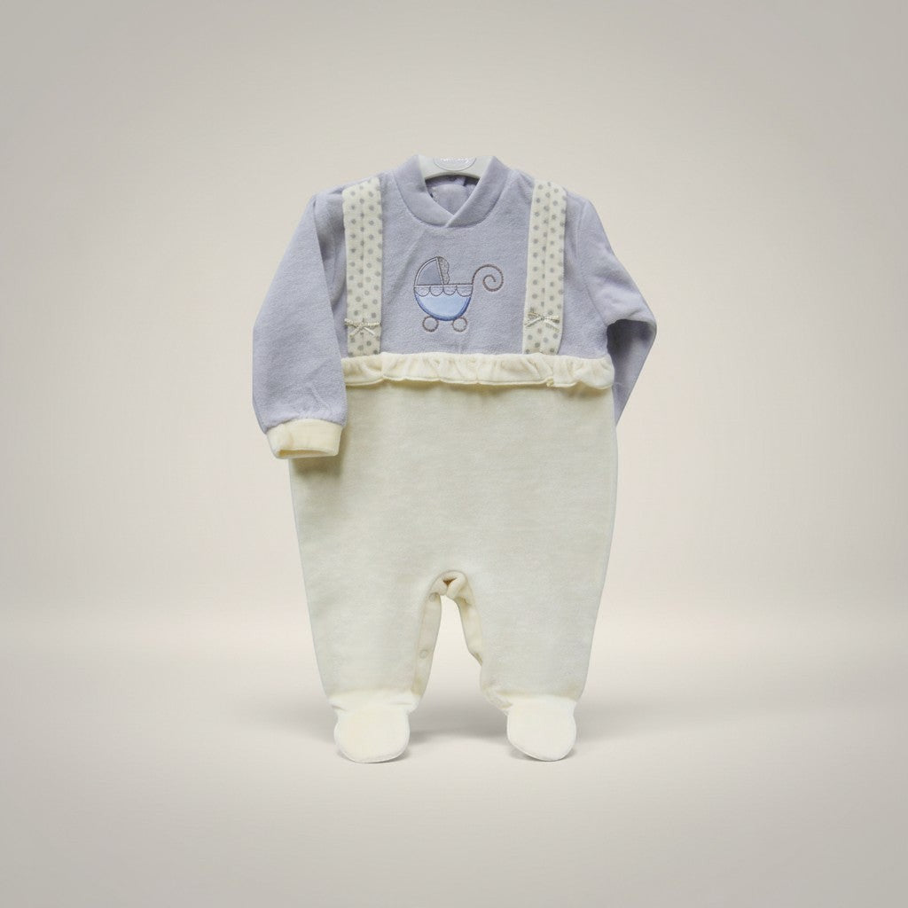 Baby outfit with light blue top and white pants on a gray background
