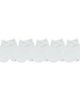 Set of white socks arranged in a row on a white background