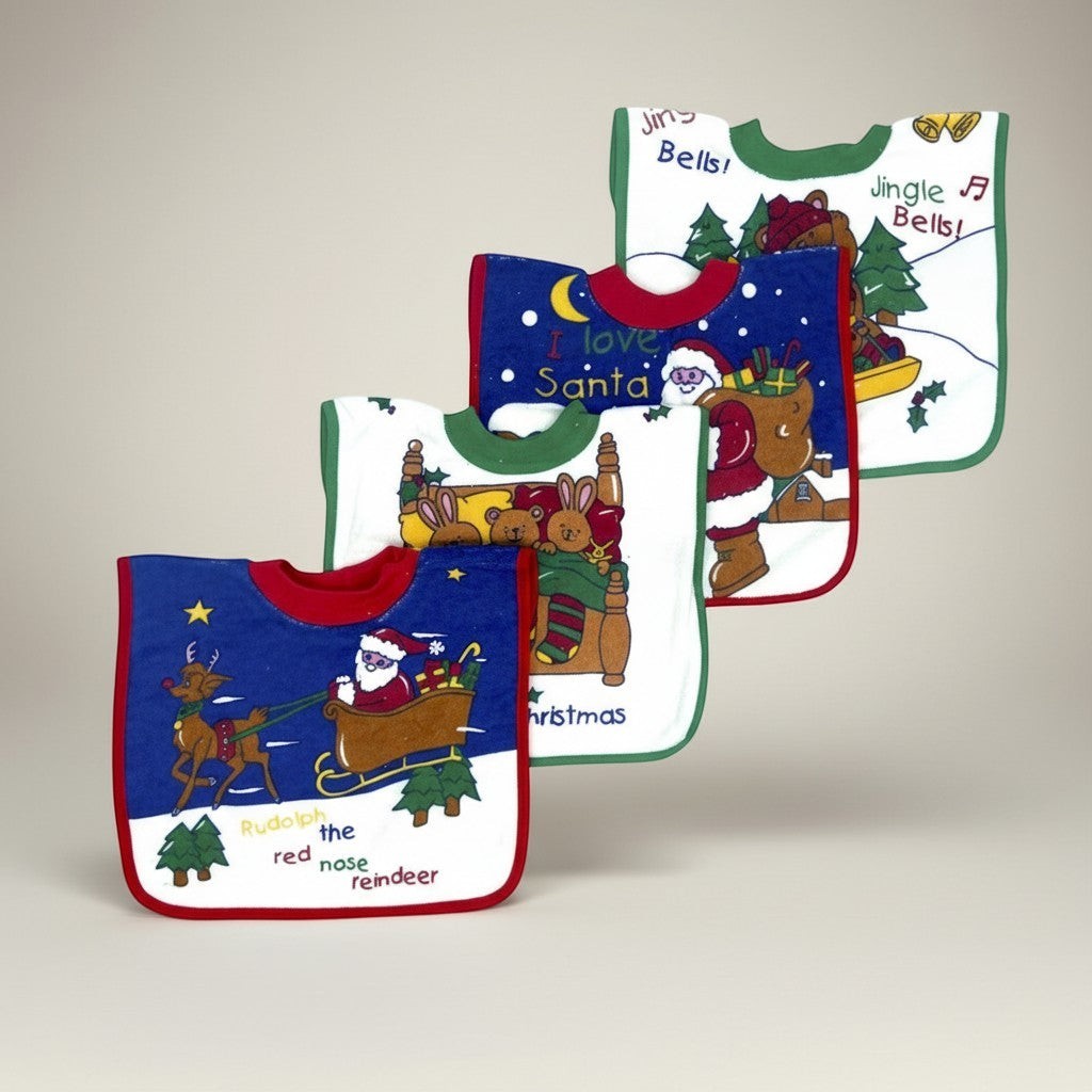 Set of Christmas-themed baby bibs on a light gray background