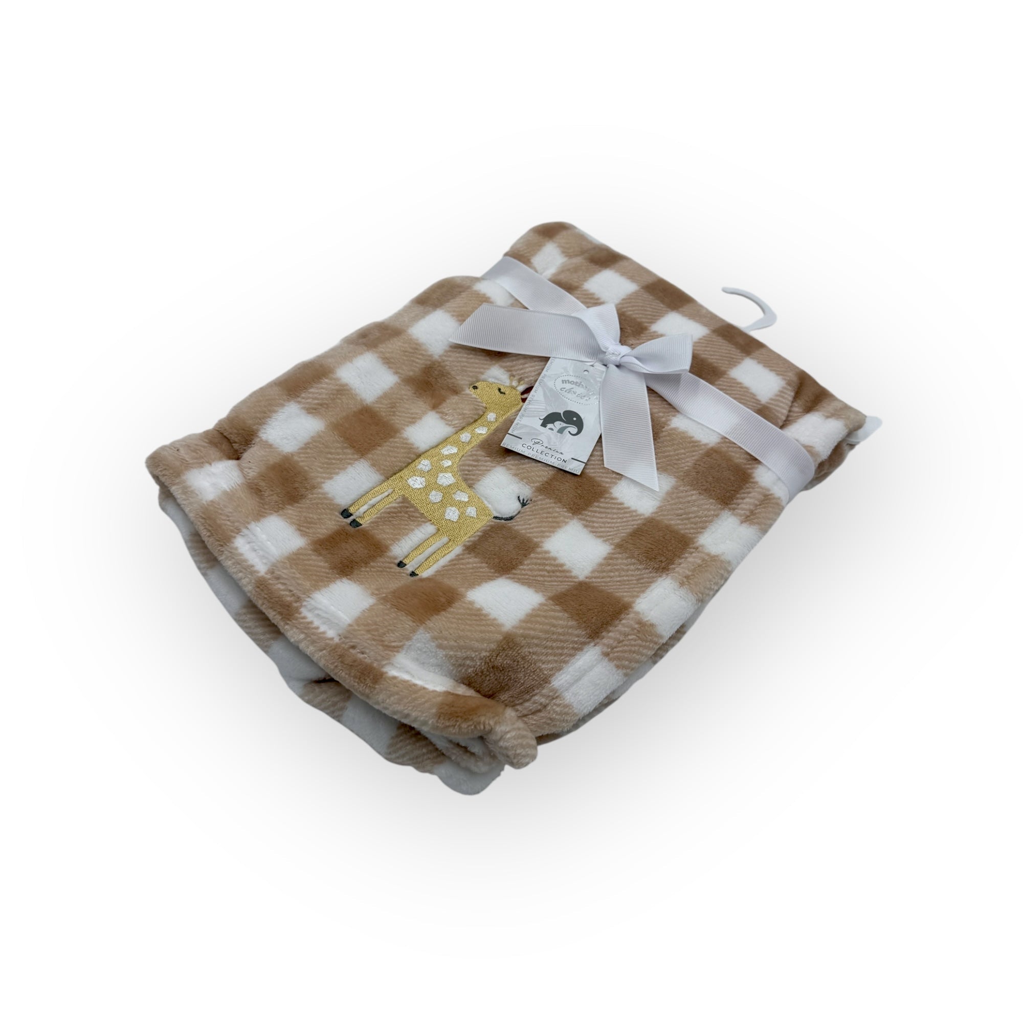 Checkered blanket with a giraffe design and tag on a white background