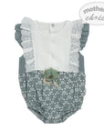 Baby romper with floral pattern and lace details on a white background, featuring 'Mother's Choice' branding.