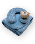 Blue neck pillow with bear design on a white background