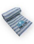 Folded blue and white striped blanket with an elephant design and 'TONS OF FUN' text on a white background
