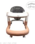 Baby high chair with pink base and gray cushion on a white background, featuring 'mother's choice' branding.