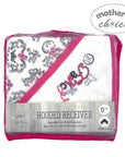 Hooded receiver blanket with pink and gray patterns in packaging, branded 'Mother's Choice'.