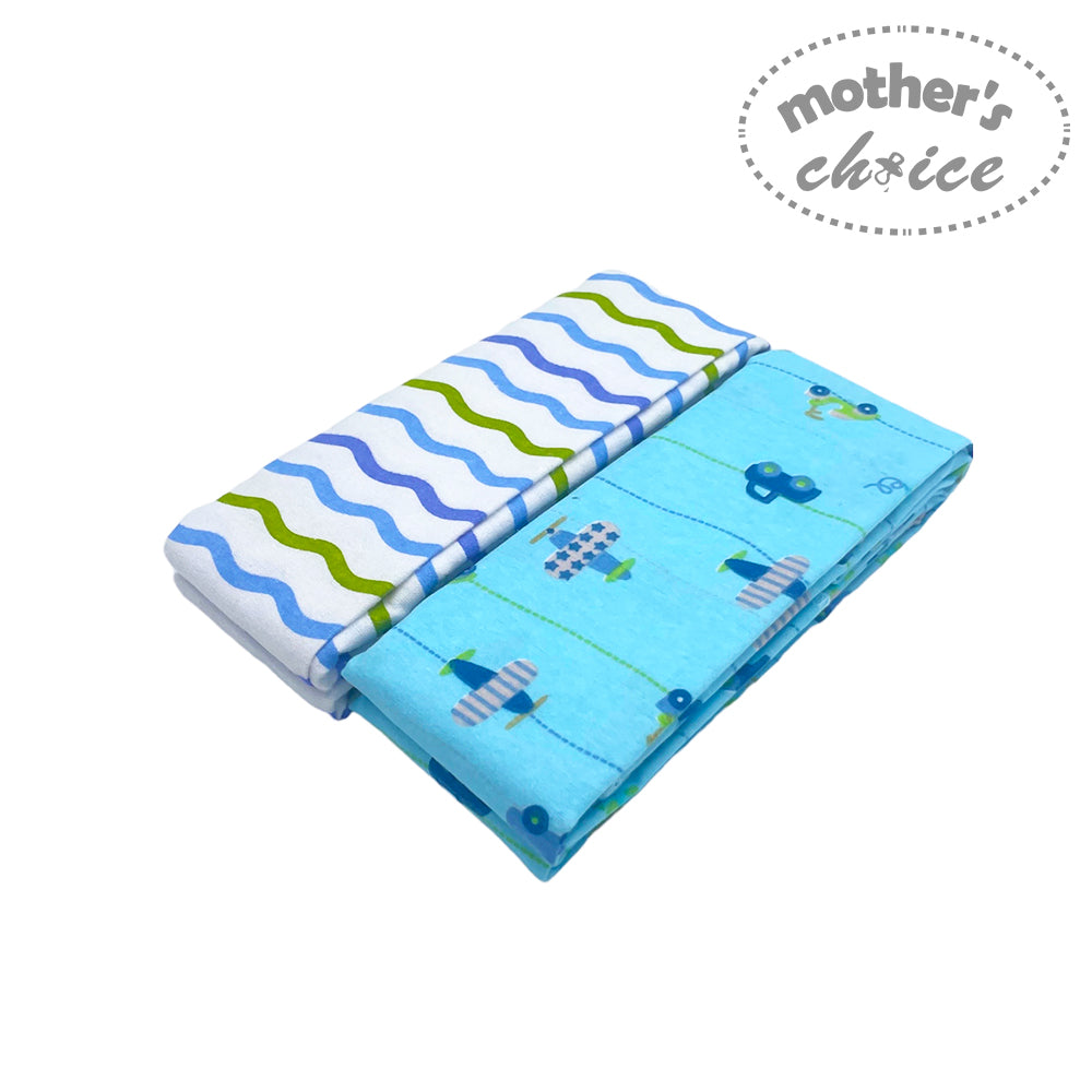 Folded baby blanket with wavy pattern and airplane design on a white background, branded 'Mother's Choice'.