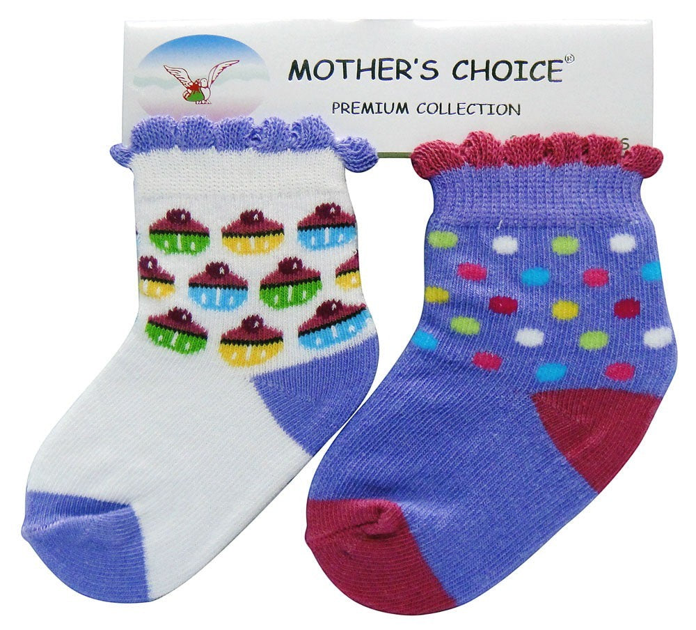 Two pairs of children's socks with colorful patterns on a 'Mother's Choice' branded card.