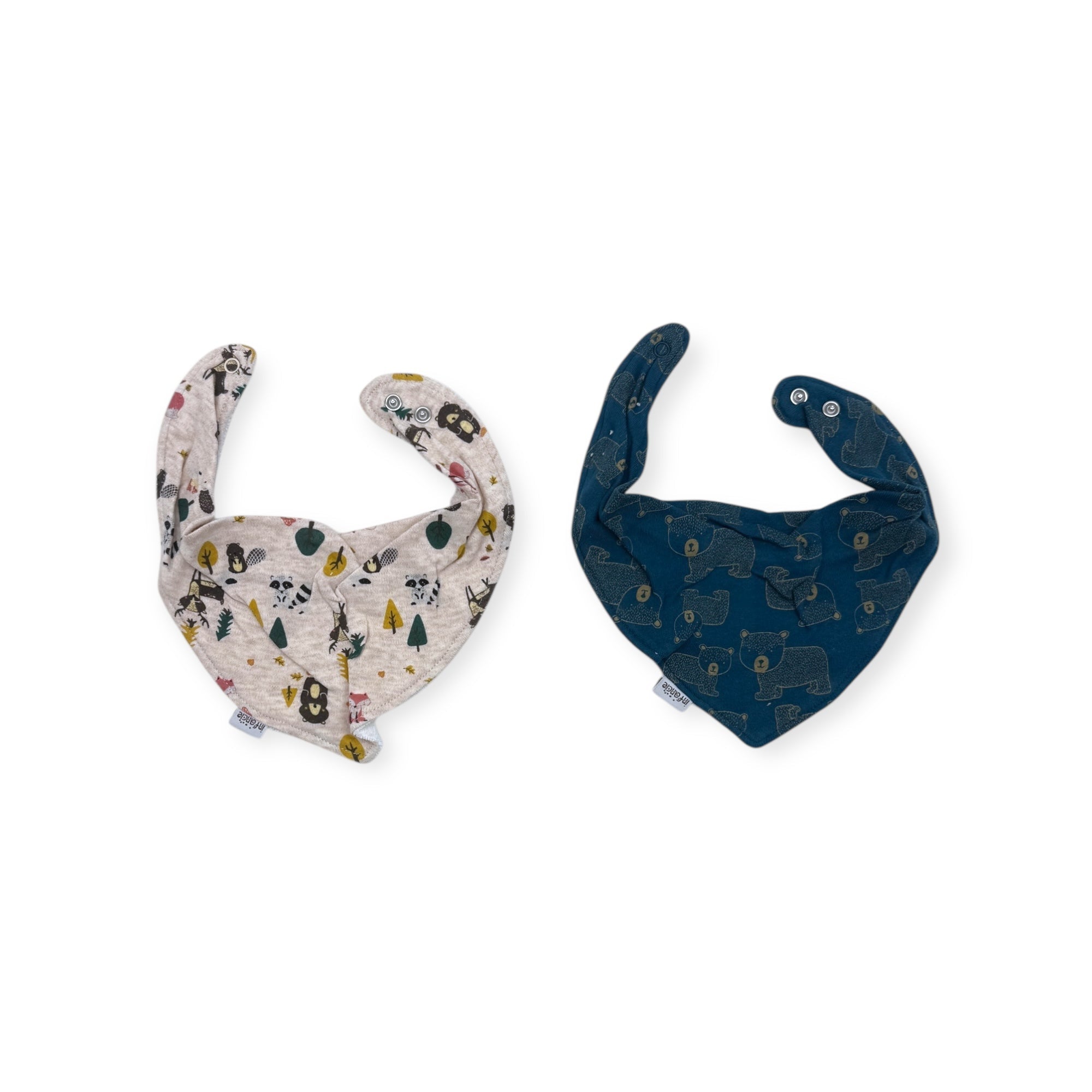 Two baby bibs with animal patterns on a white background