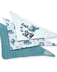 Set of baby bandannas with helicopter design and 'Reach for the Sky' text on a white background