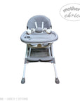 Gray high chair with 'Mother's Choice' branding on a white background