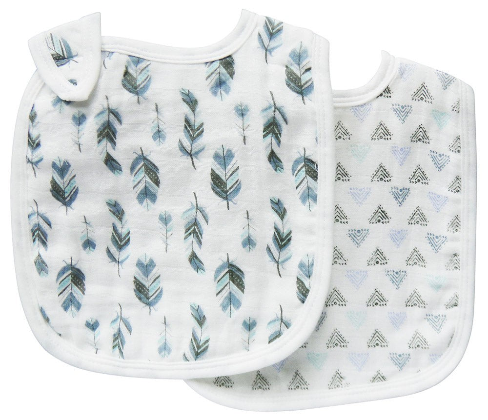 Two baby bibs with feather and triangle patterns on a white background