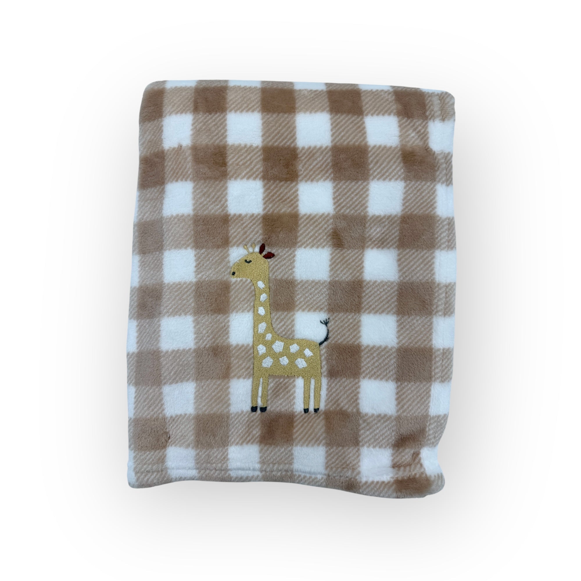 Plaid blanket with a giraffe design on a white background