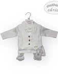 Baby outfit set with shirt, vest, and pants on a hanger against a white background.